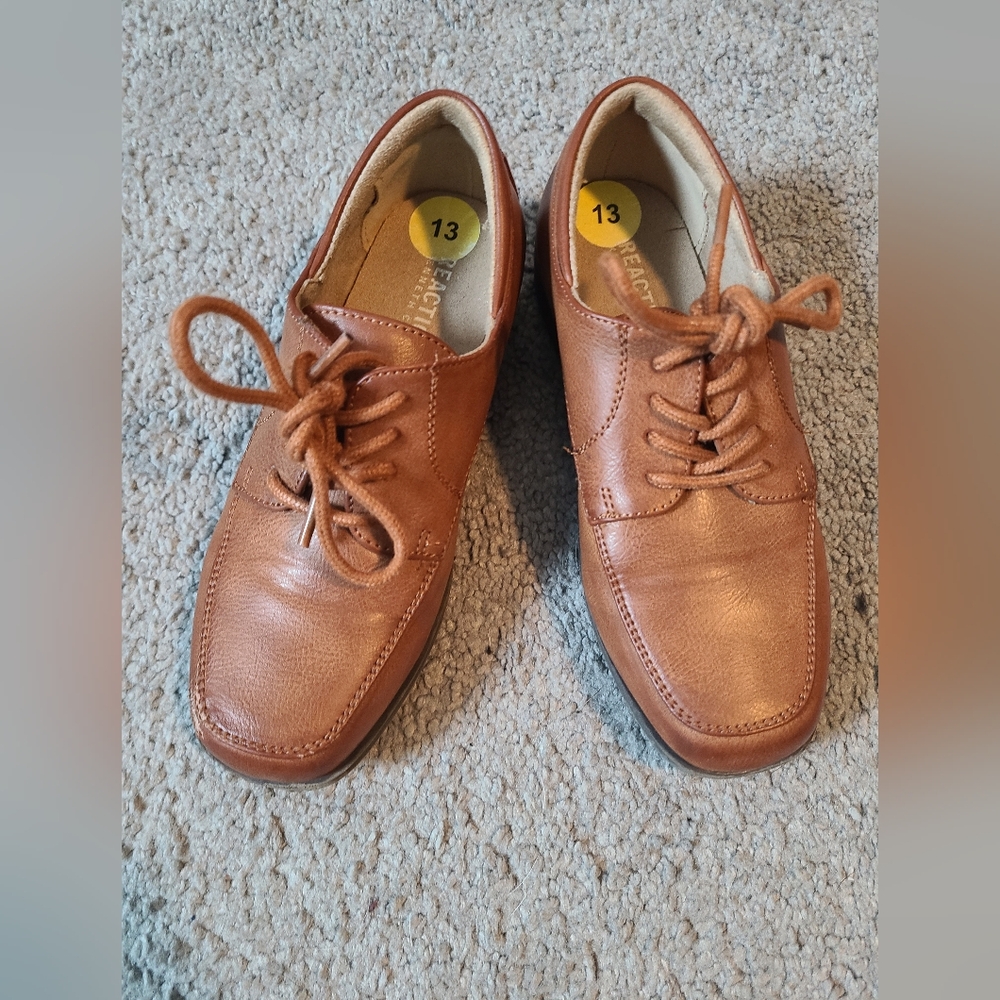Boy's dress shoes size 13, worn once. Small scuff on right shoe.
